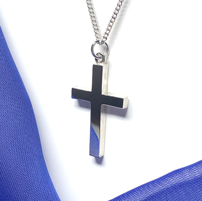 Polished plain heavy solid sterling silver cross on a curb chain