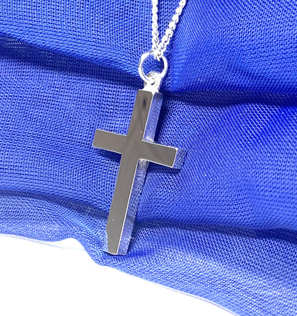 Polished plain heavy solid sterling silver cross on a curb chain