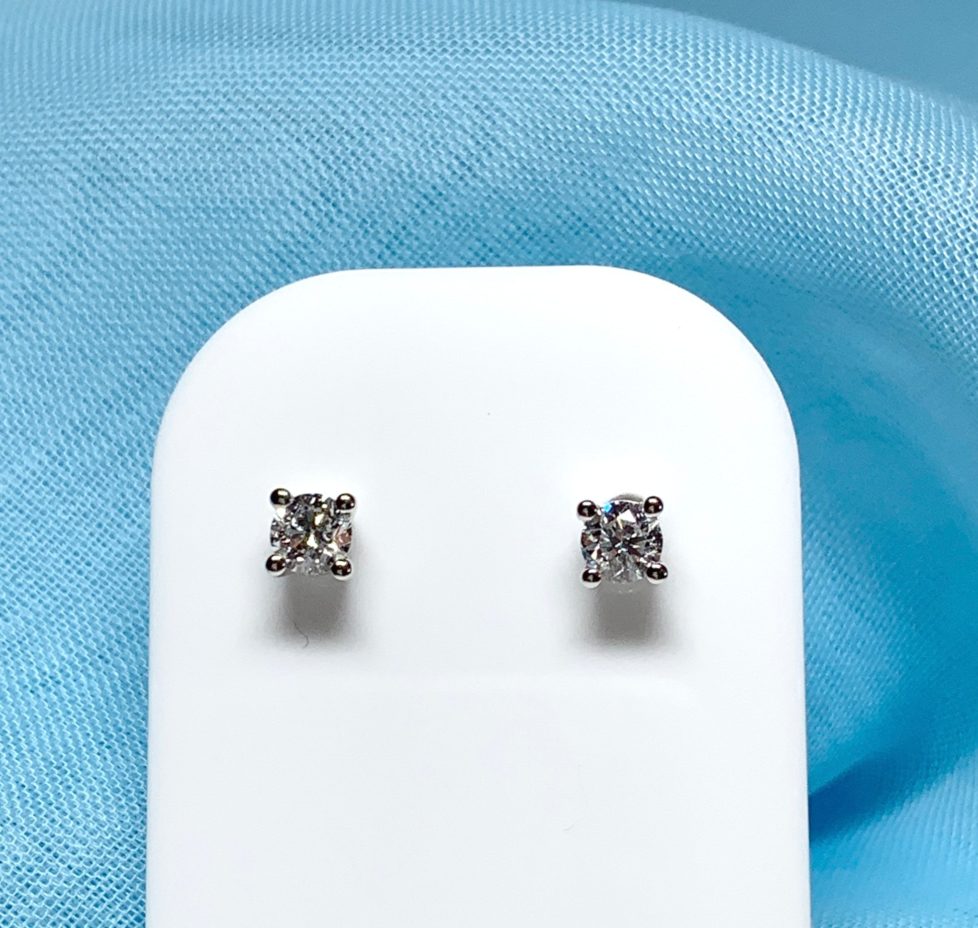 Platinum diamond stud earrings single stone claw setting 40 points