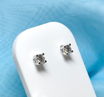 Platinum diamond stud earrings single stone claw setting 40 points