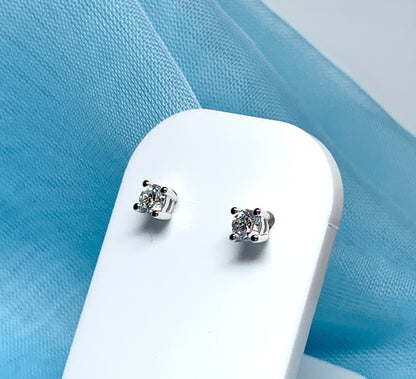 Platinum diamond stud earrings single stone claw setting 40 points