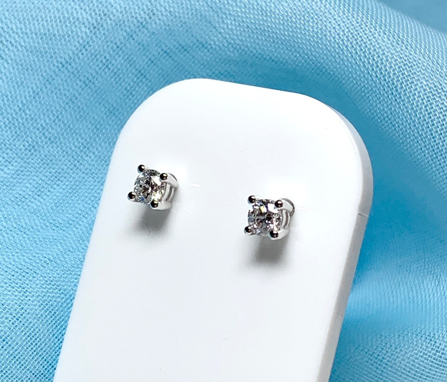 Platinum diamond stud earrings single stone claw setting 40 points