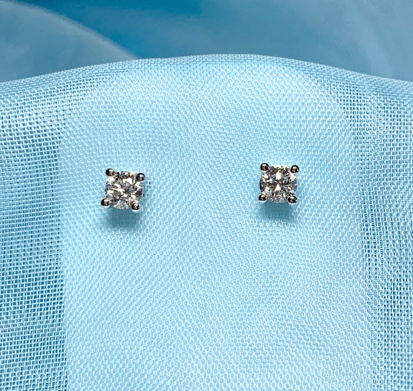 Platinum diamond stud earrings single stone claw setting 40 points