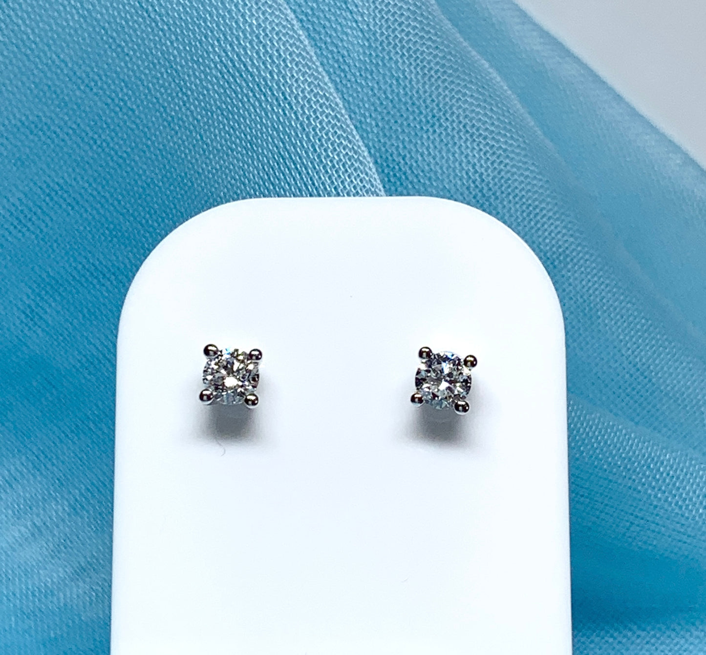 Platinum diamond stud earrings single stone claw setting 40 points