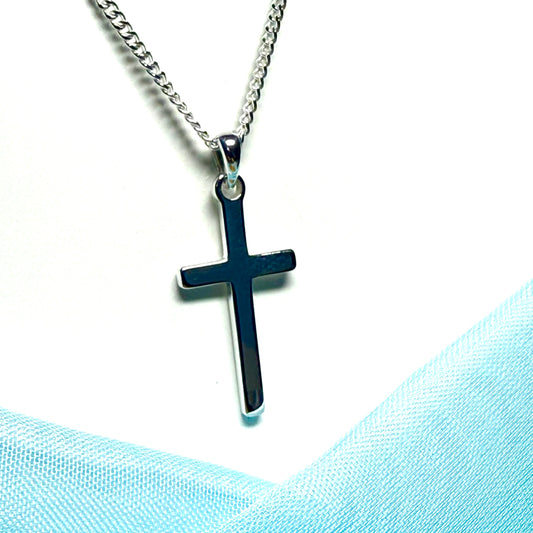 Polished plain solid sterling silver cross including a curb chain