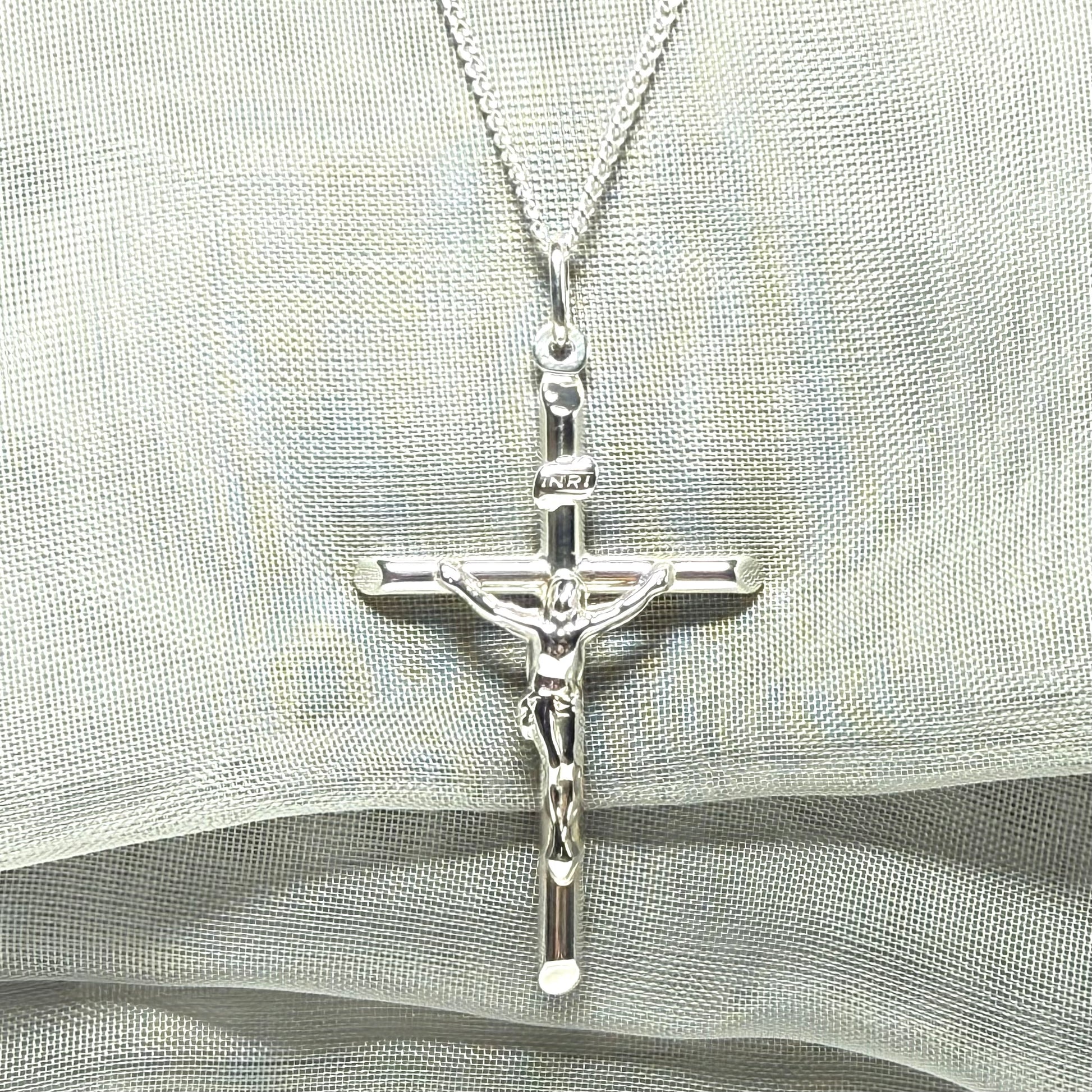 Polished sterling silver crucifix cross necklace including chain