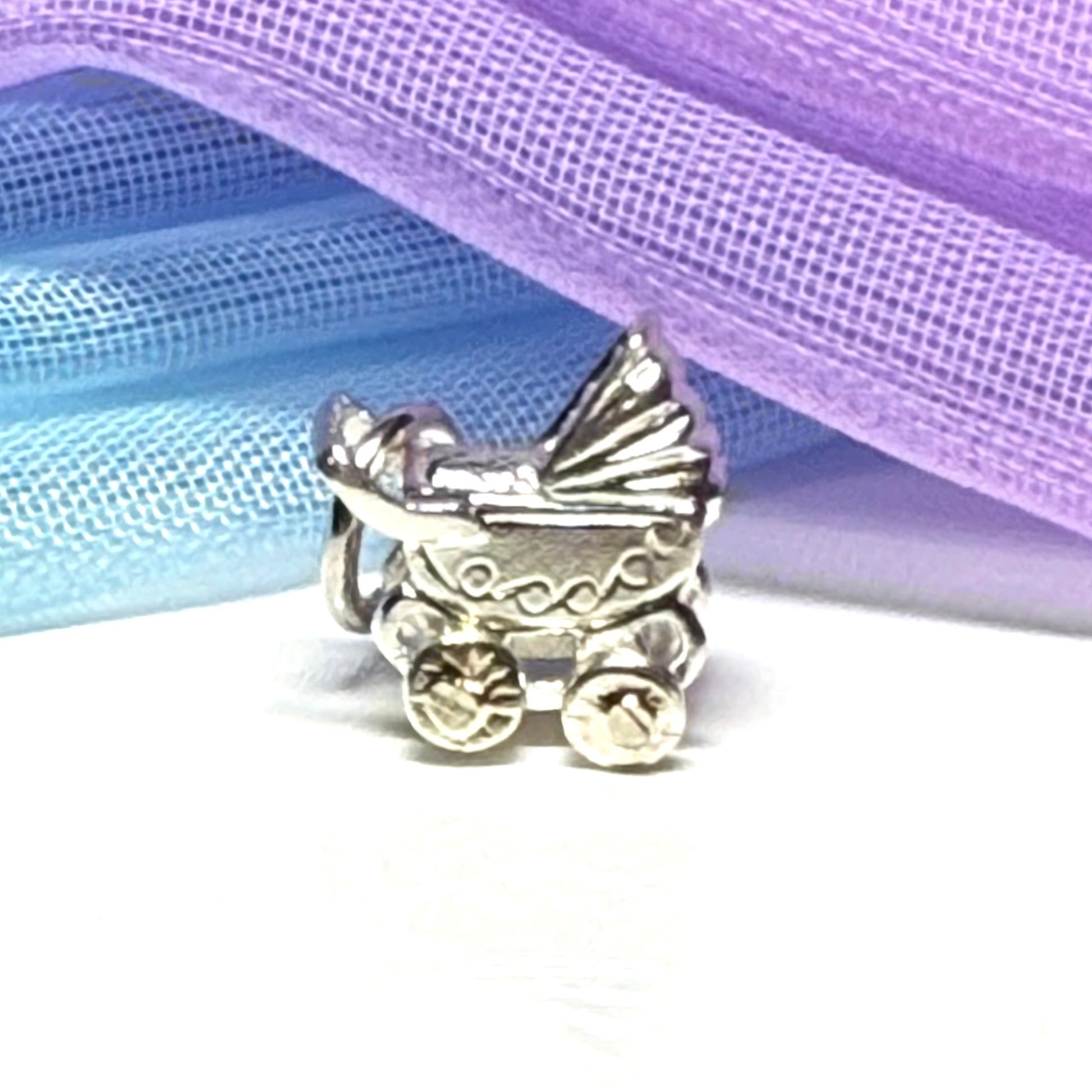 A Pram Shape Charm Sterling Silver
