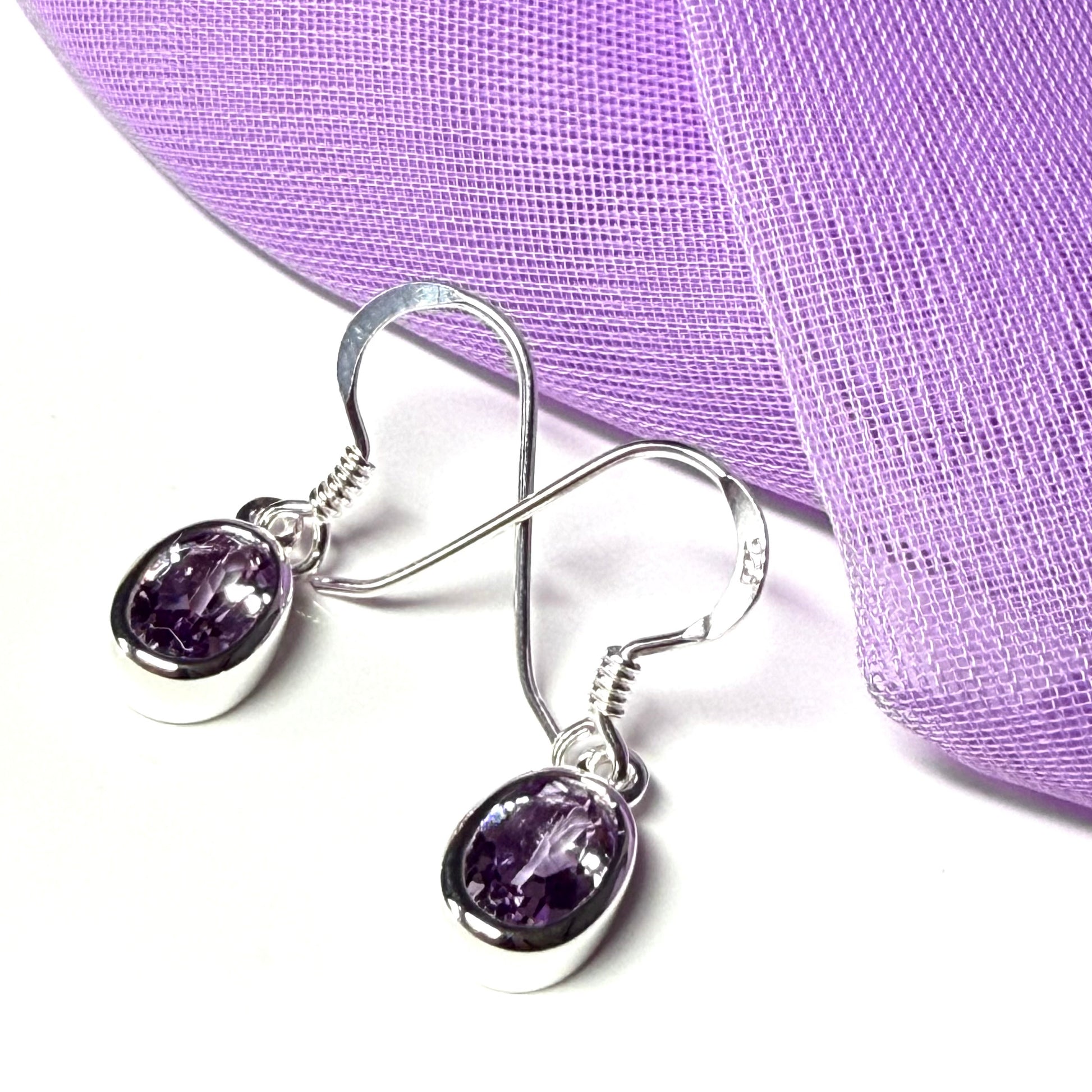 Purple oval shaped amethyst sterling silver drop earrings
