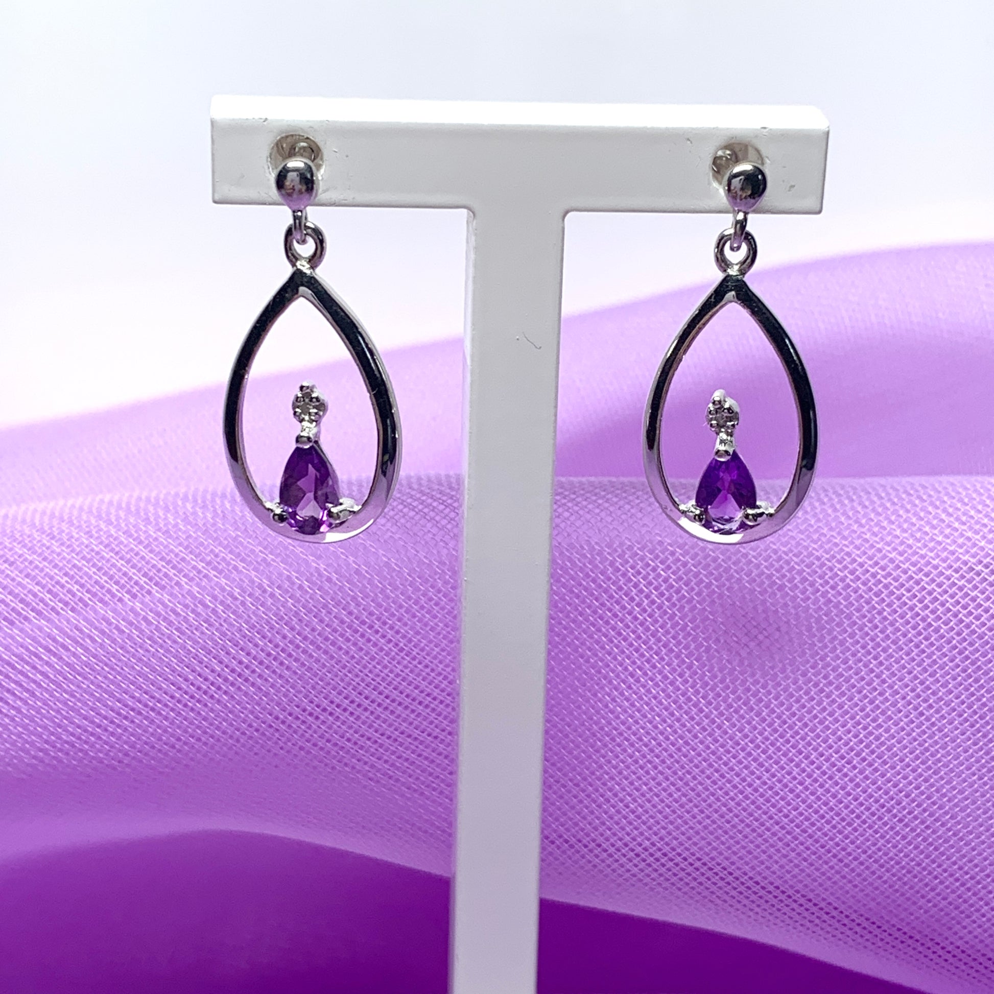 Purple amethyst and diamond sterling silver pear shaped drop earrings