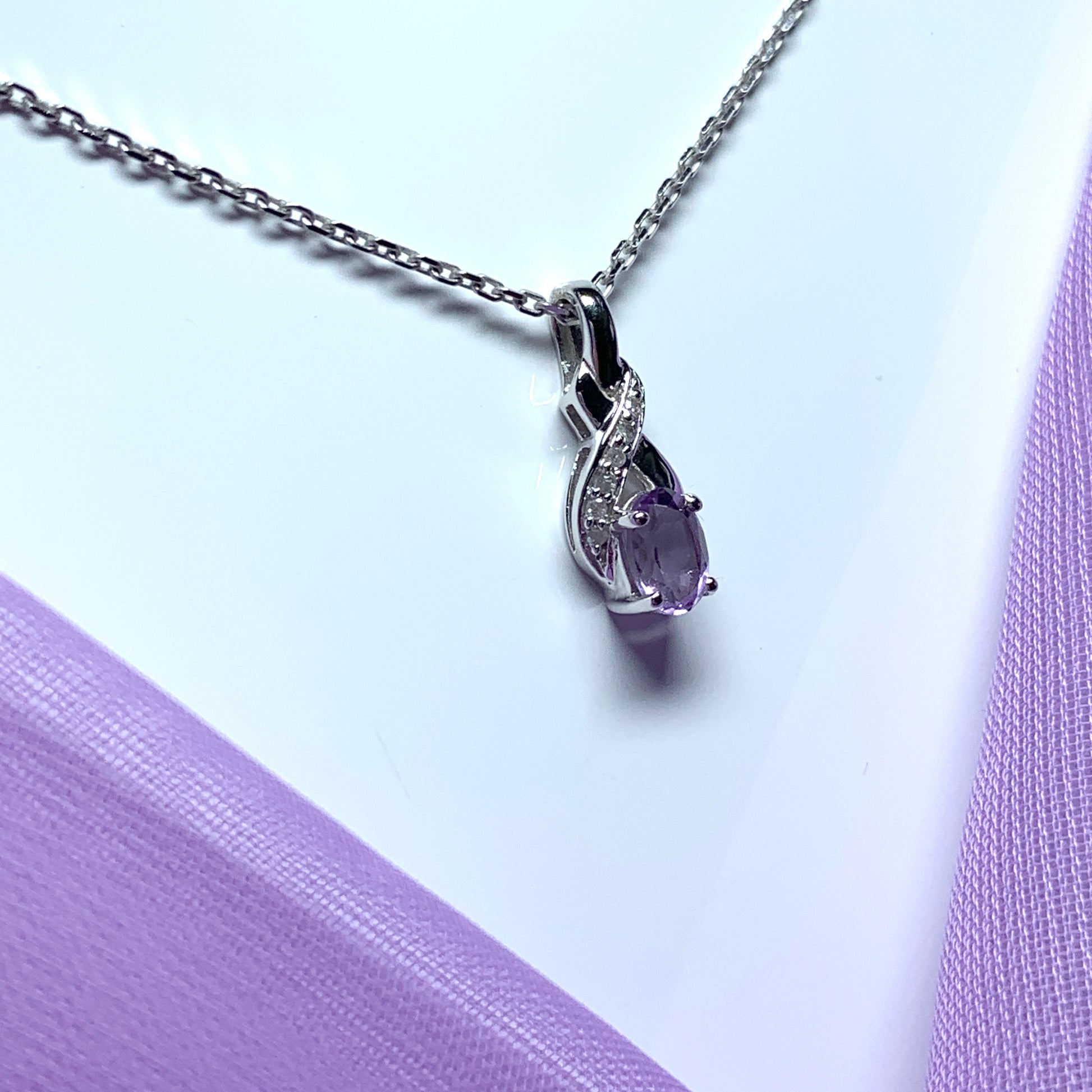 Purple amethyst and diamond white gold necklace