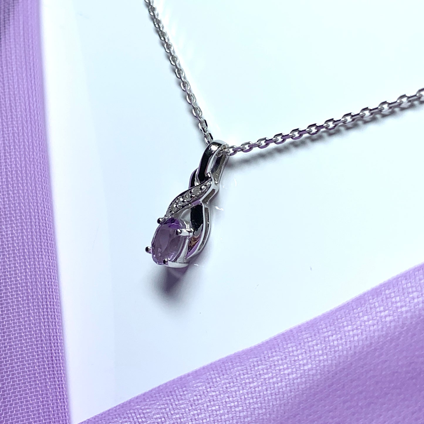 Purple amethyst and diamond white gold necklace