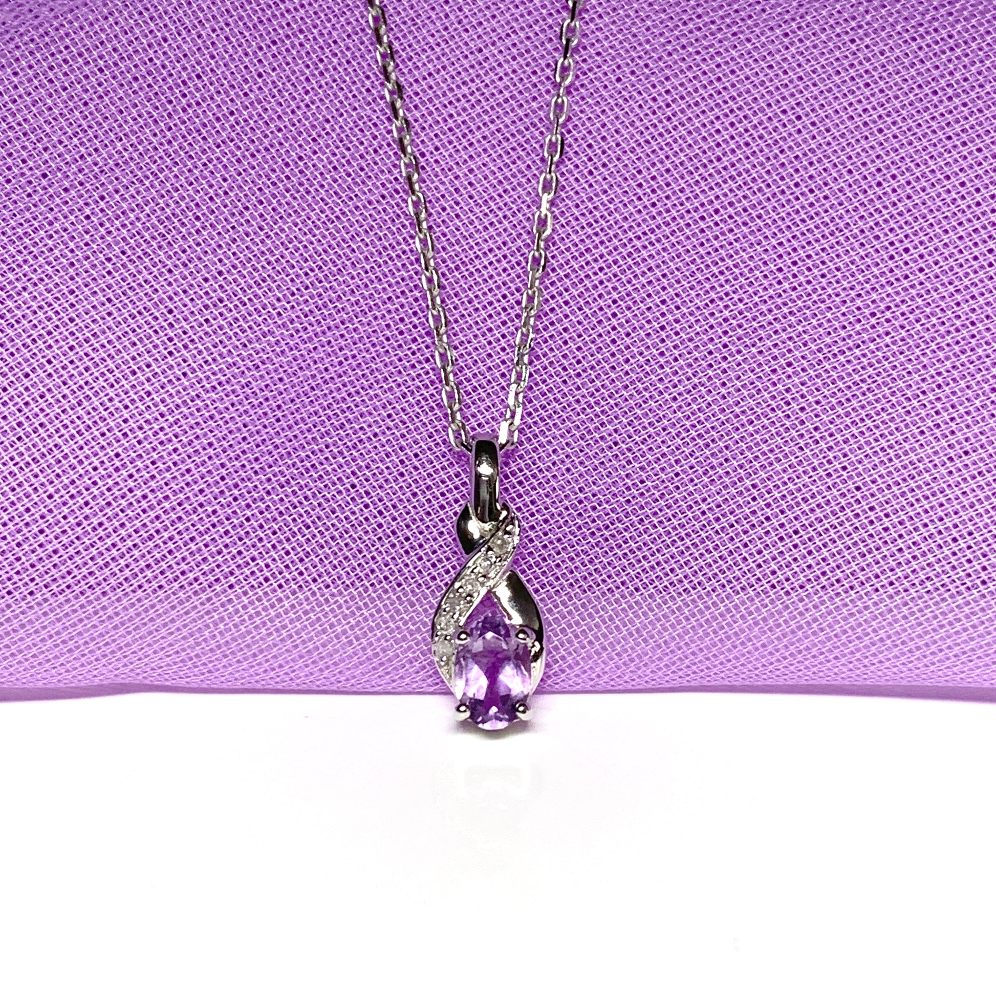 Purple amethyst and diamond white gold necklace
