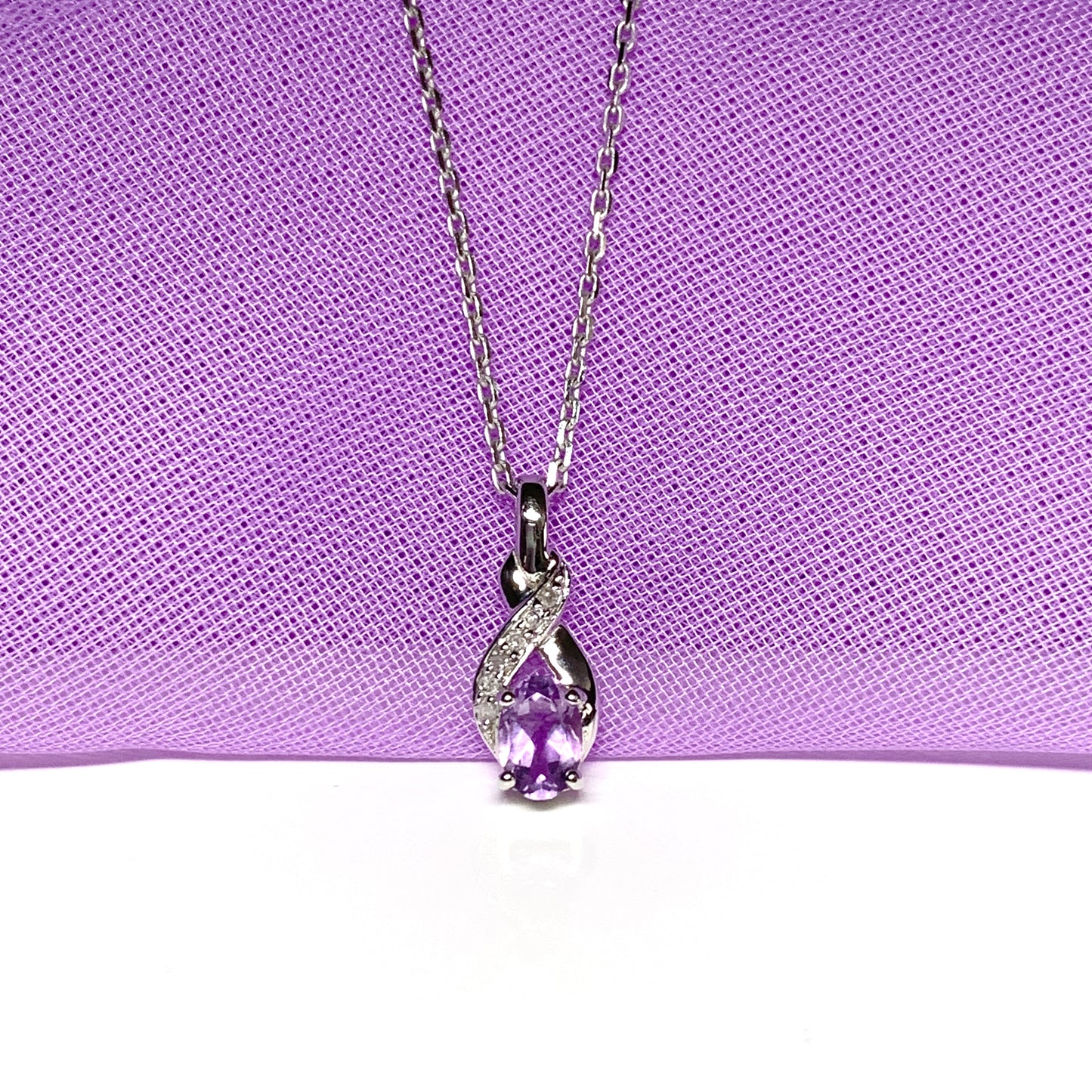 Purple amethyst and diamond white gold necklace