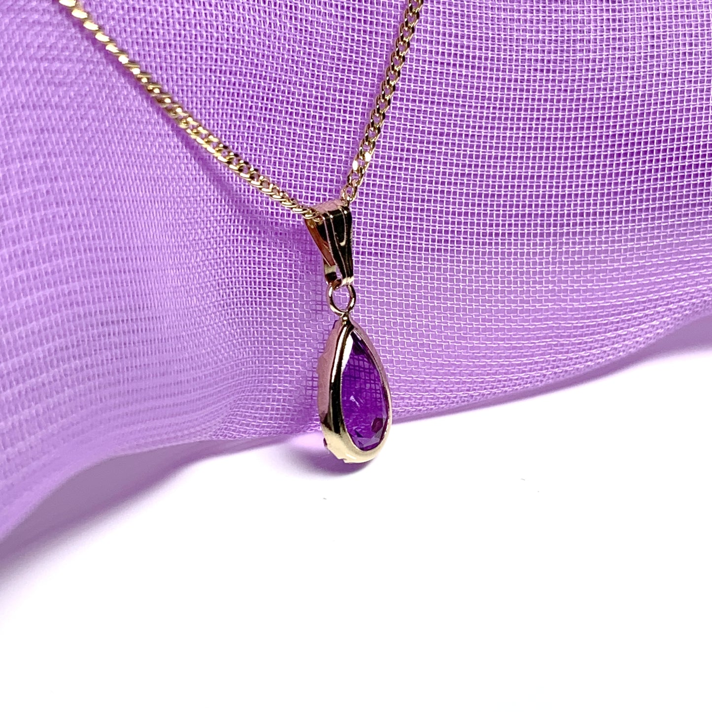 Purple amethyst pear shaped yellow gold necklace