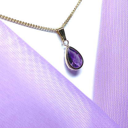 Purple amethyst pear shaped yellow gold necklace