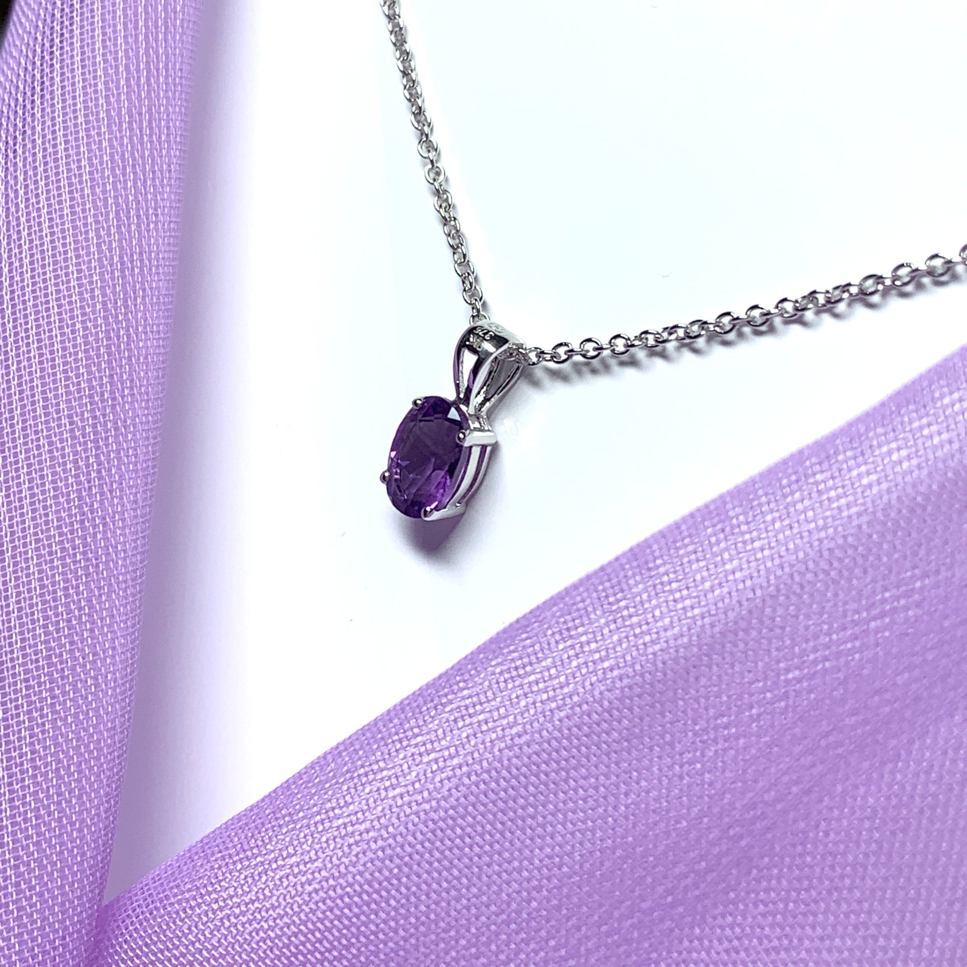 Purple oval amethyst white gold necklace