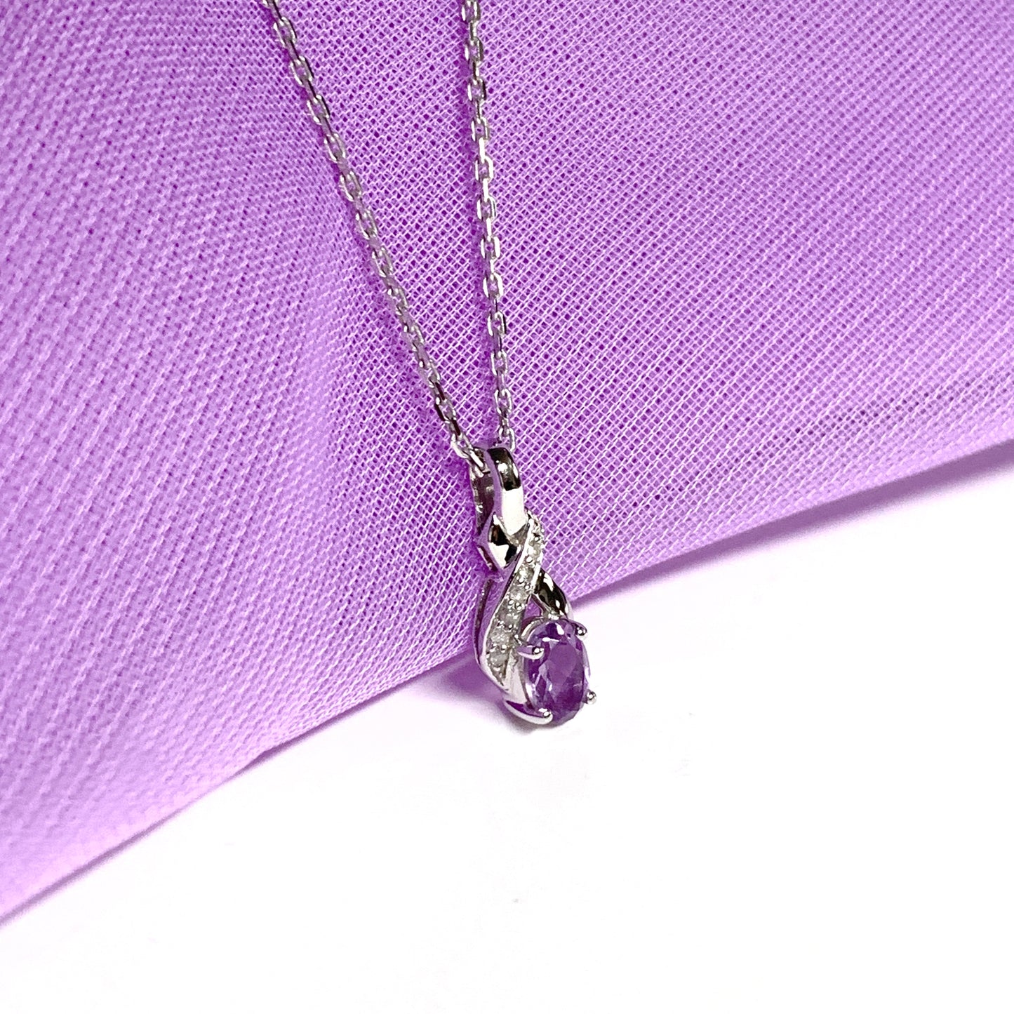 Purple amethyst and diamond white gold necklace