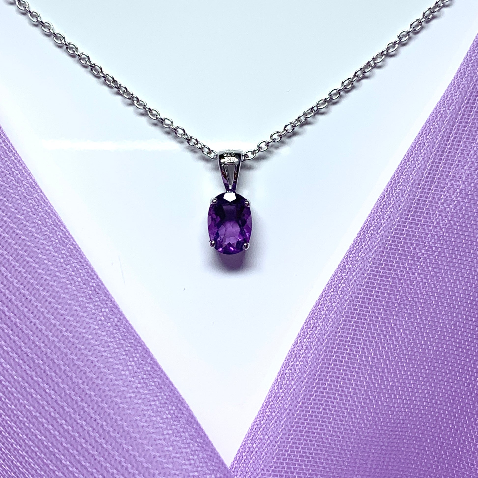 Purple oval amethyst white gold necklace