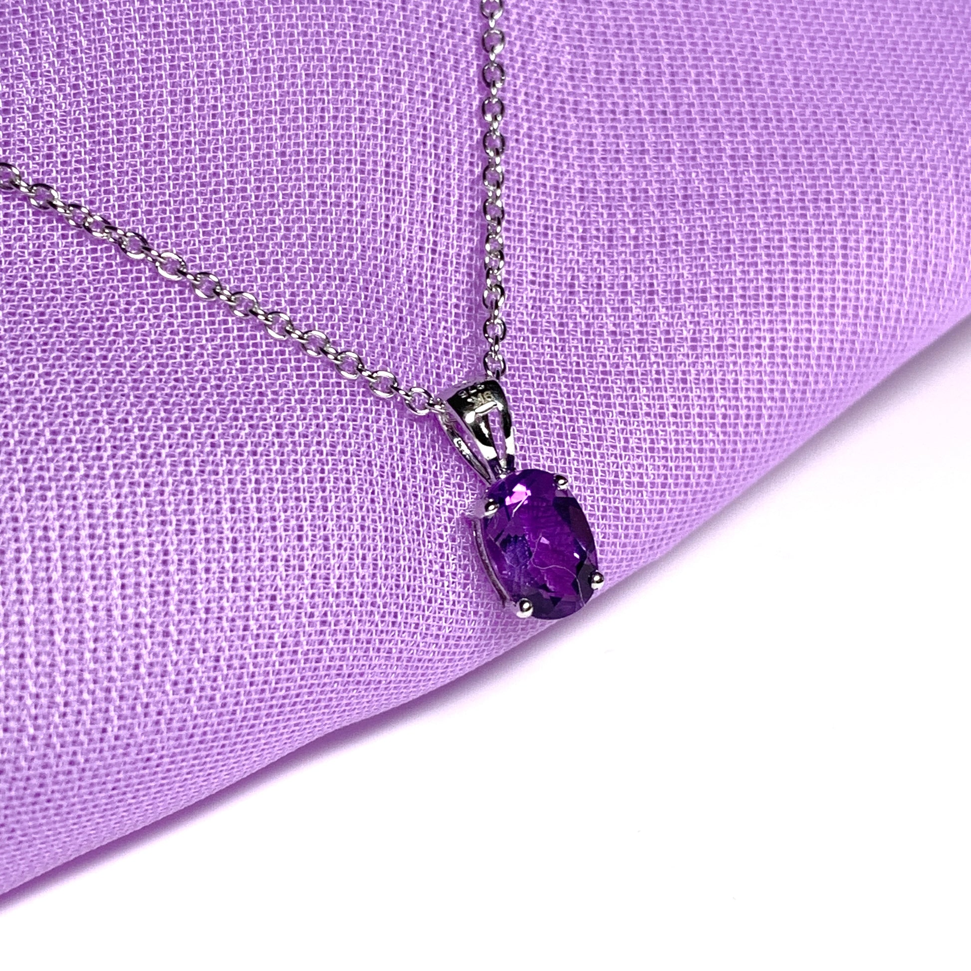 Purple oval amethyst white gold necklace