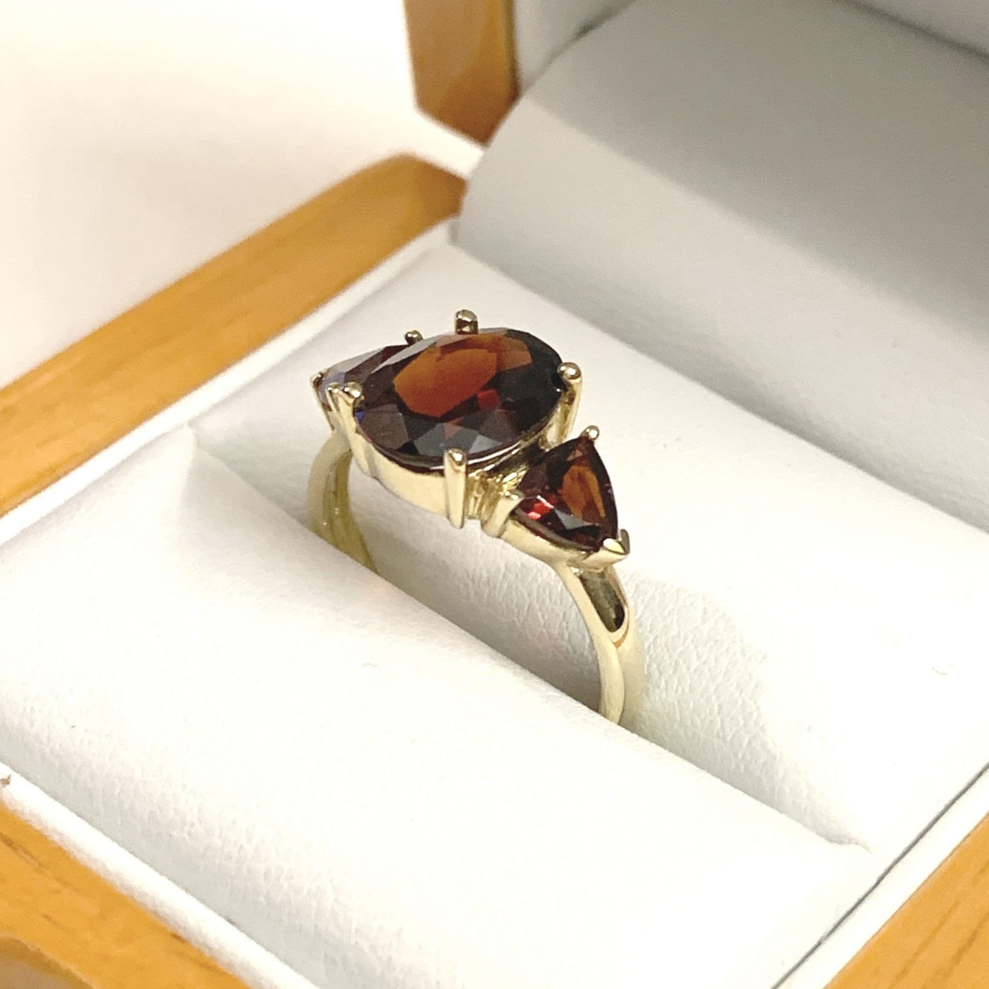 Real garnet trilogy dress ring yellow gold