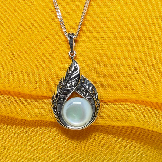 Real Mother of Pearl and marcasite sterling silver necklace round stone