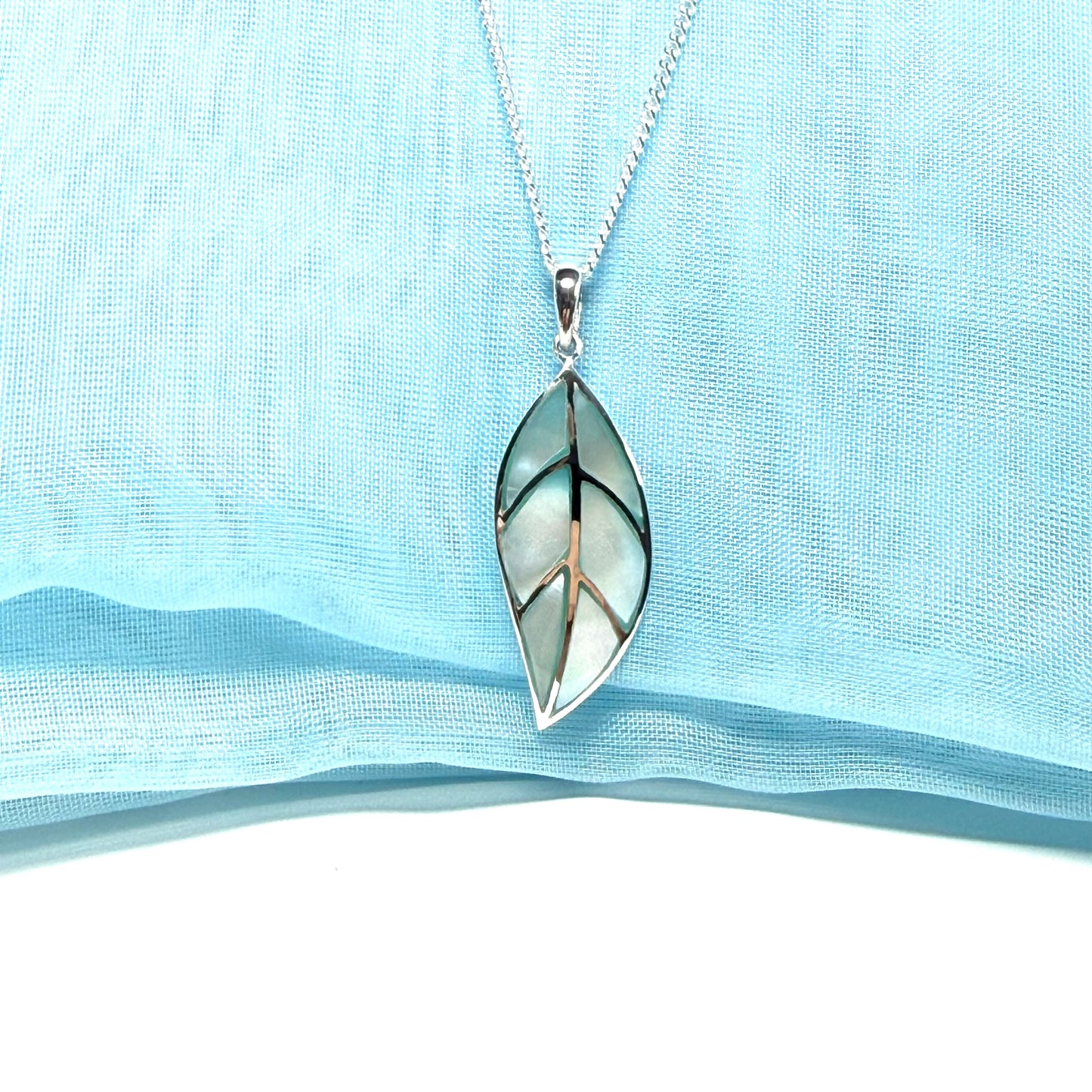 Real Mother of Pearl necklace light blue leaf shaped pendant