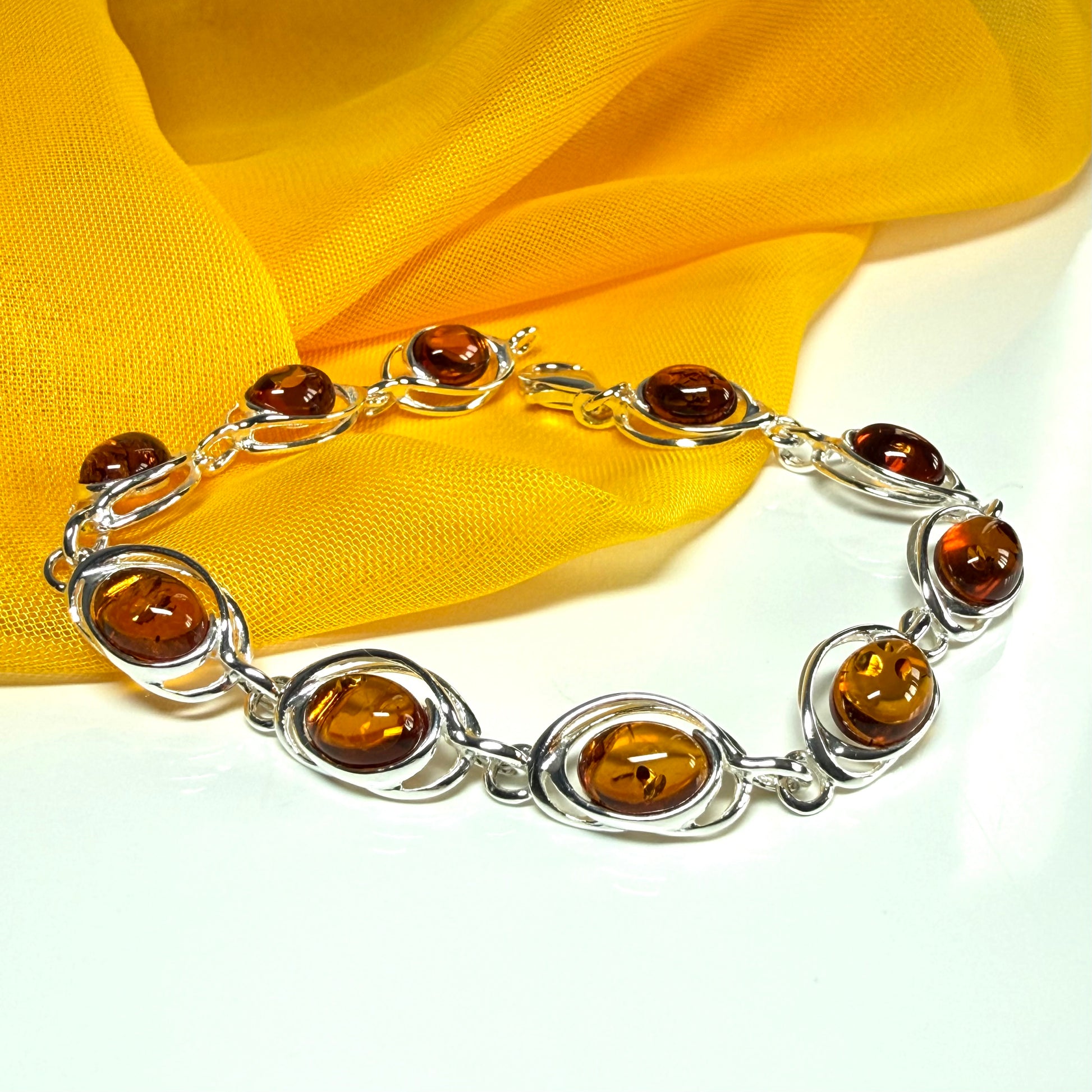 Real amber bracelet oval pierced fancy design