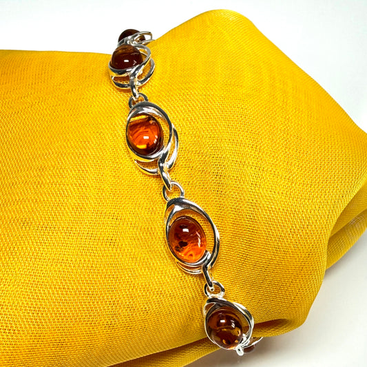 Real amber bracelet oval pierced fancy design