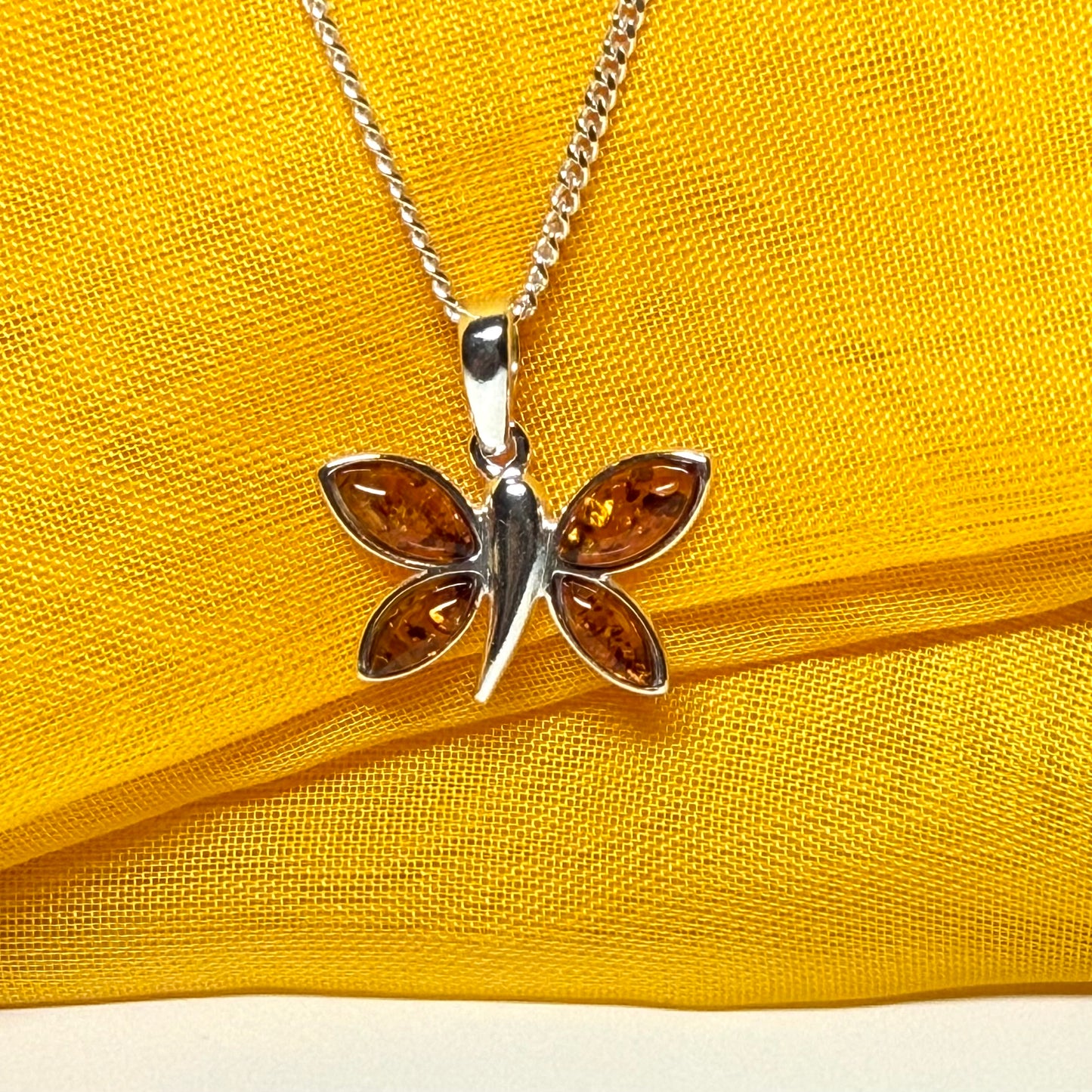Real amber butterfly shaped necklace sterling silver pendant