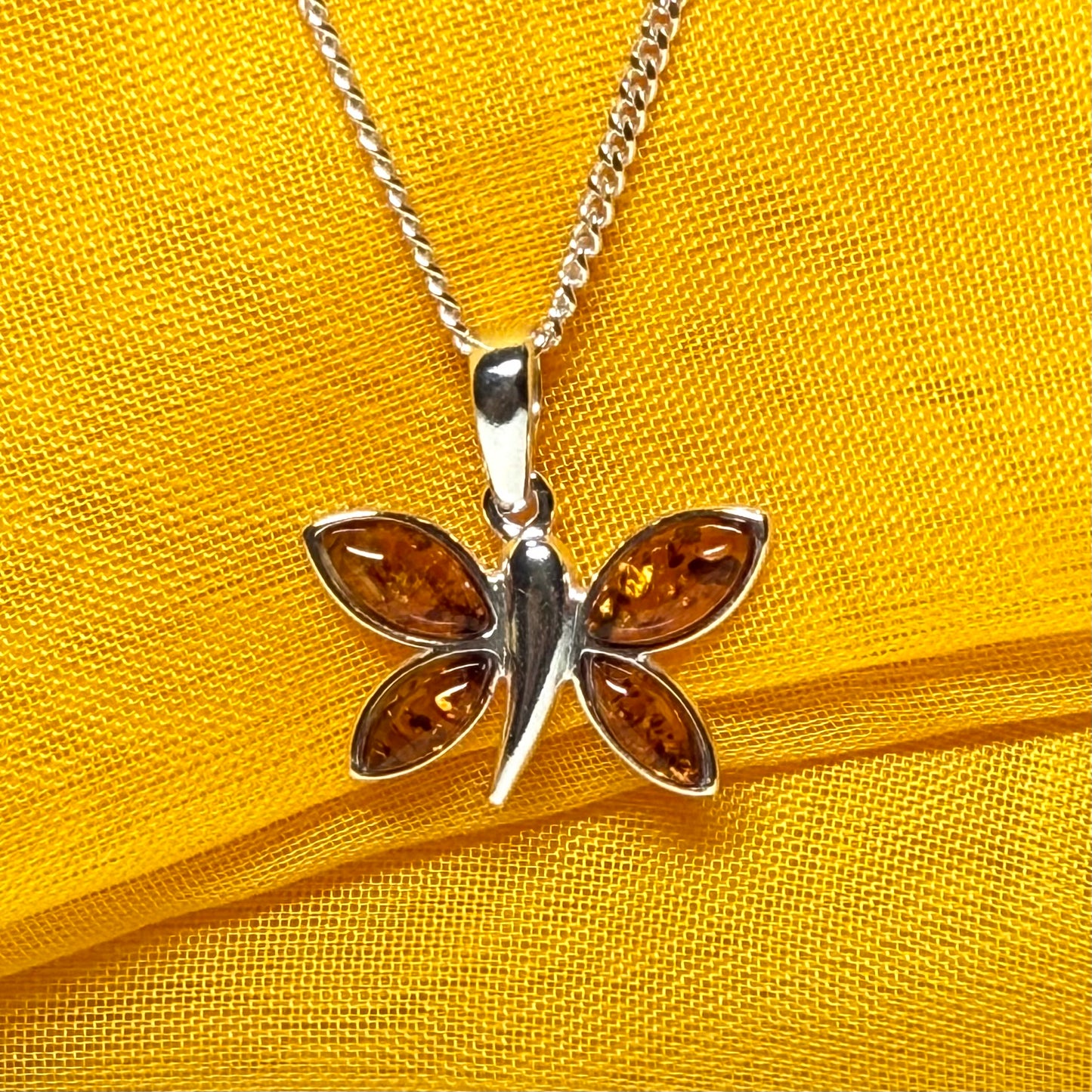 Real amber butterfly shaped necklace sterling silver pendant