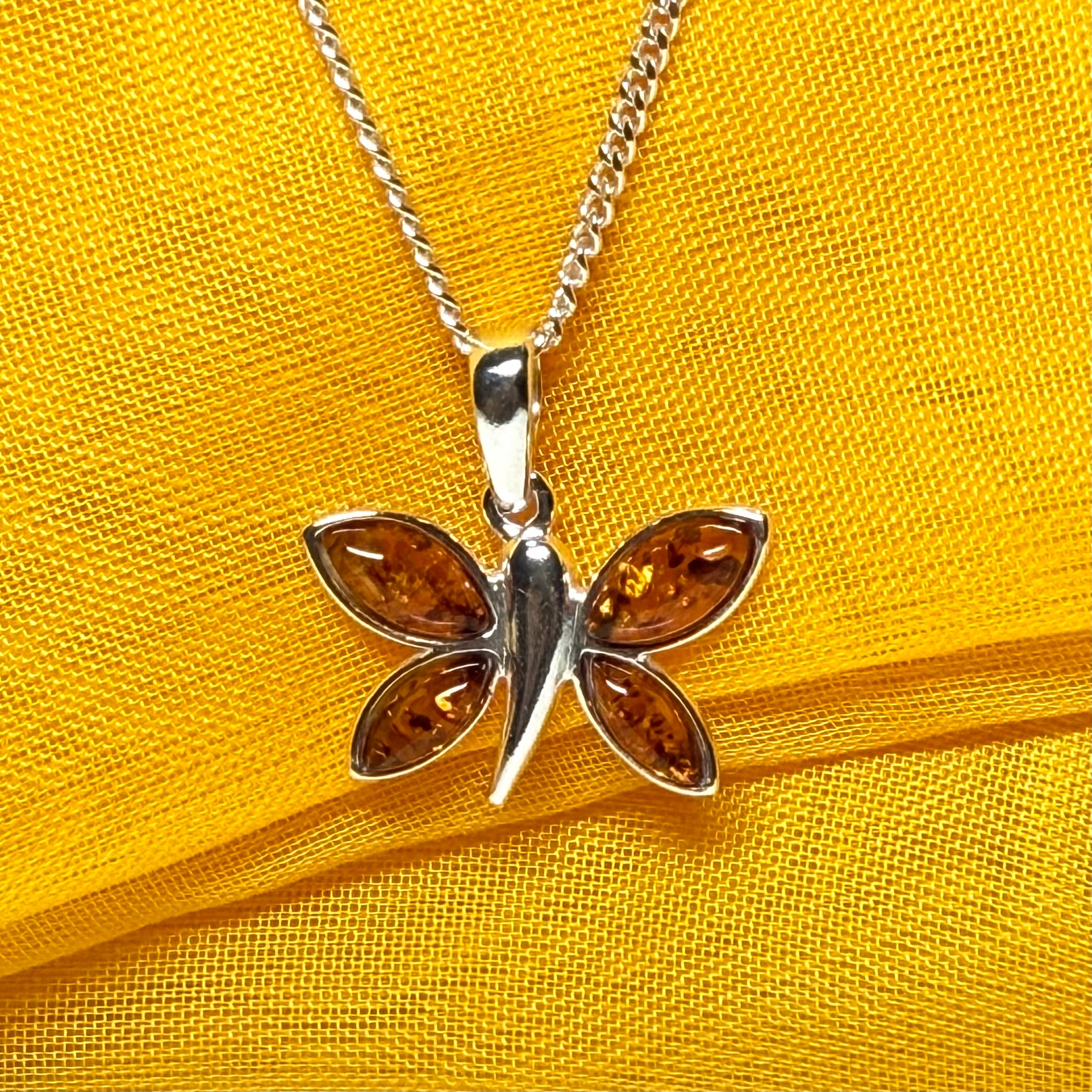 Real amber butterfly shaped necklace sterling silver pendant