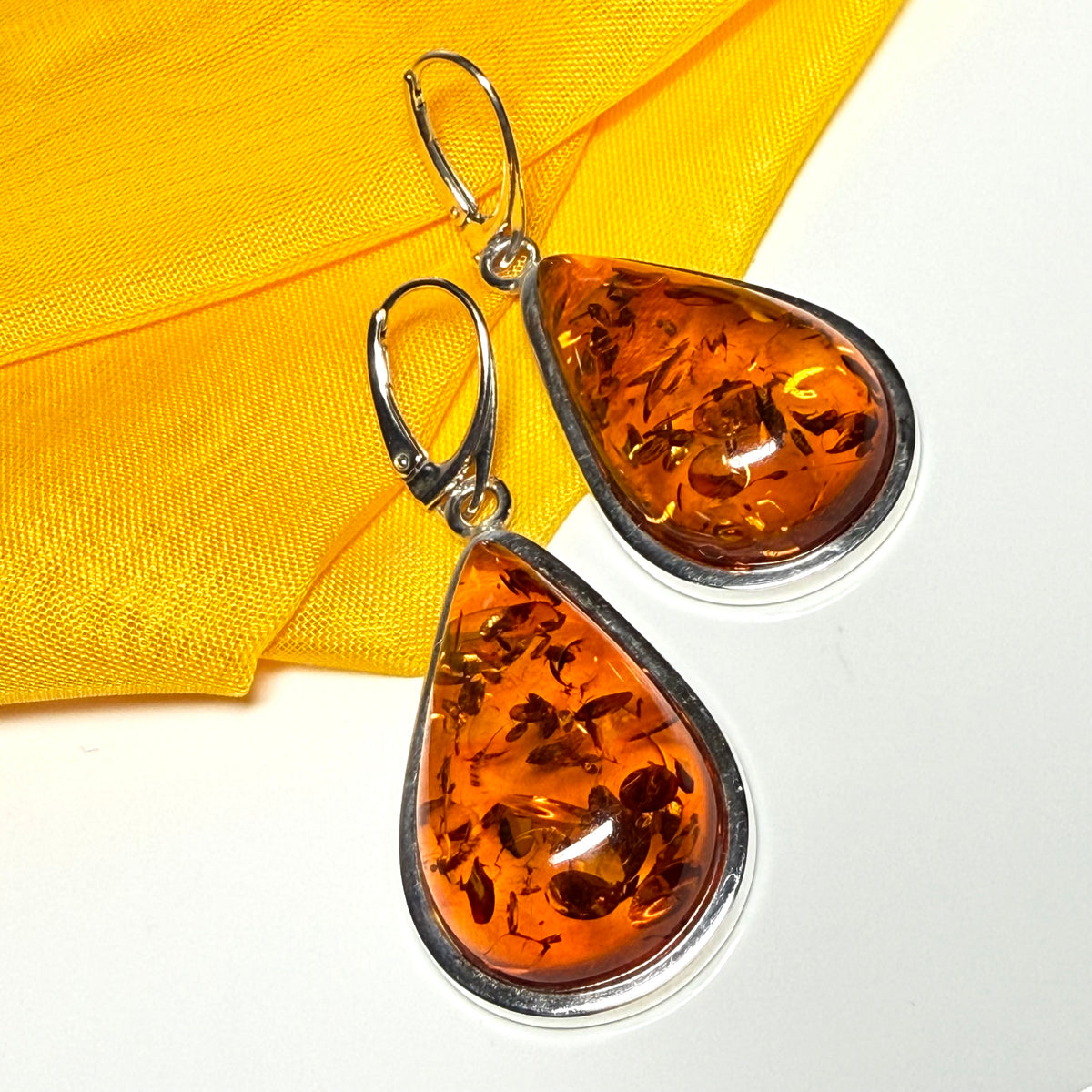 Real amber drop earrings pear shape sterling silver continental wire fittings