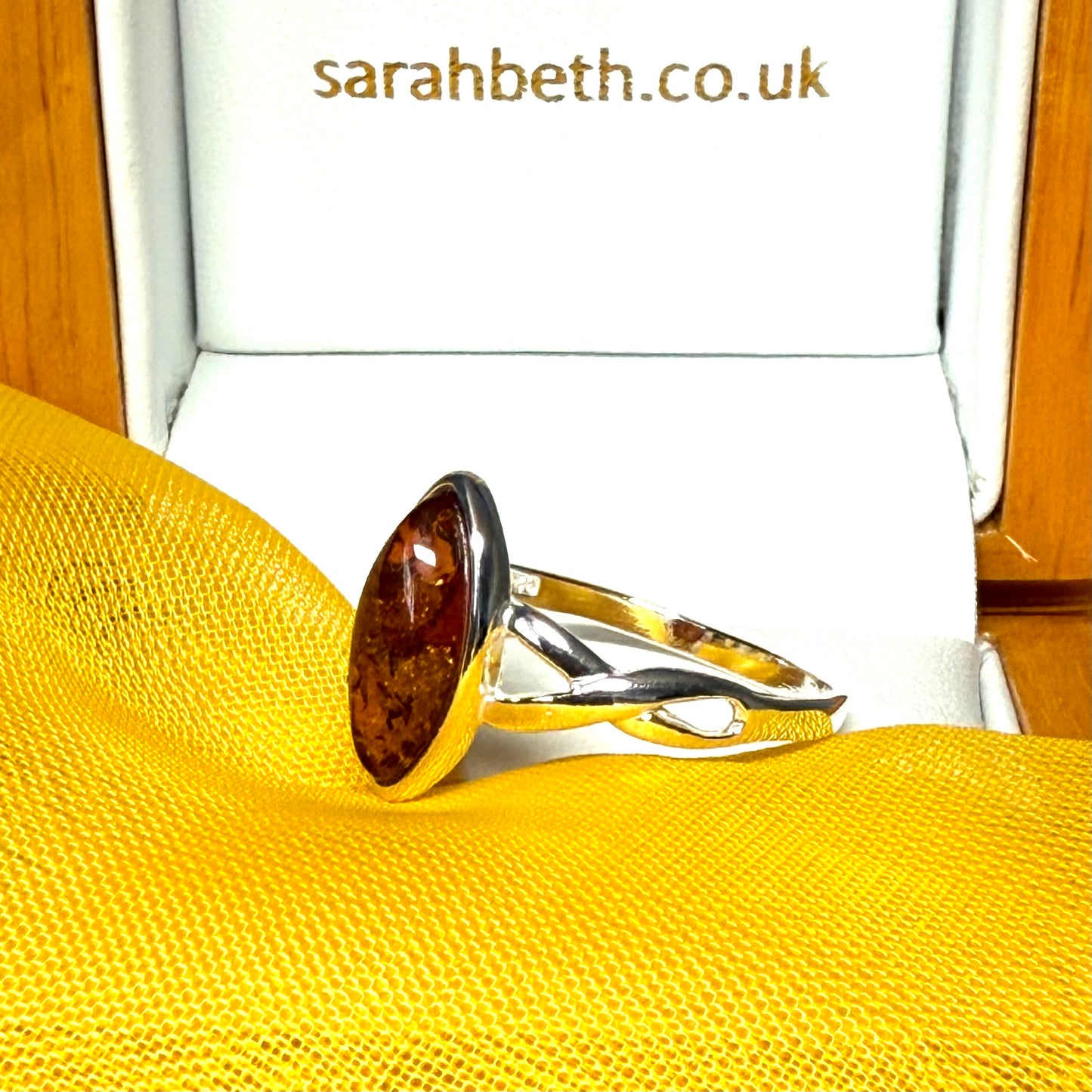 Real amber ring sterling silver marquise shaped smooth rubbed over setting pierced shoulders