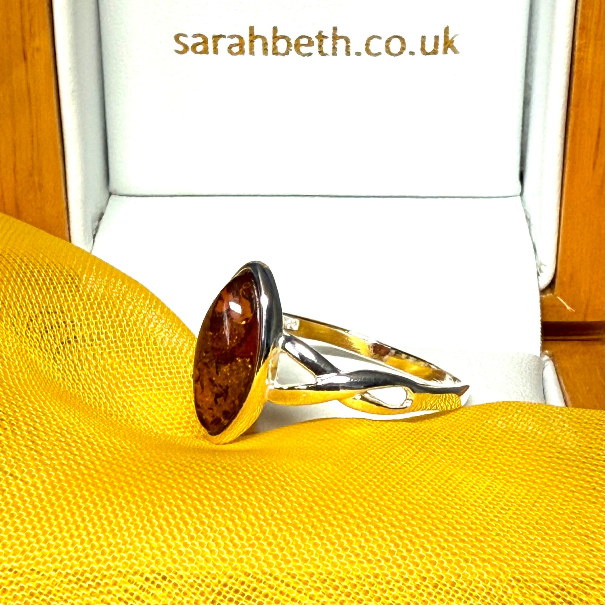 Real amber ring sterling silver marquise shaped smooth rubbed over setting pierced shoulders