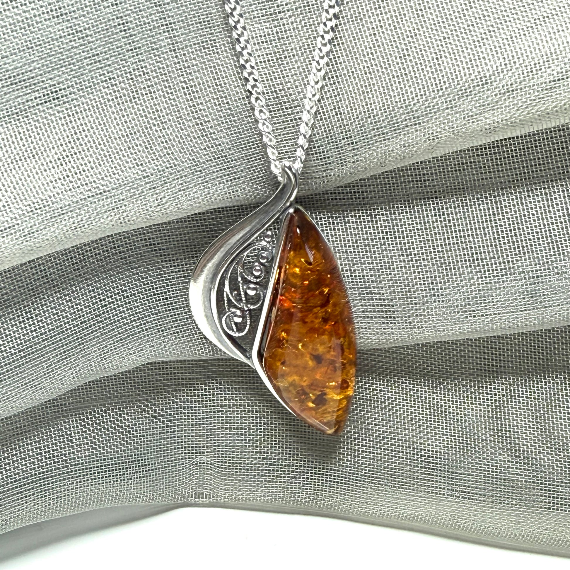 Real amber necklace sterling silver fancy half open pierced pendant design