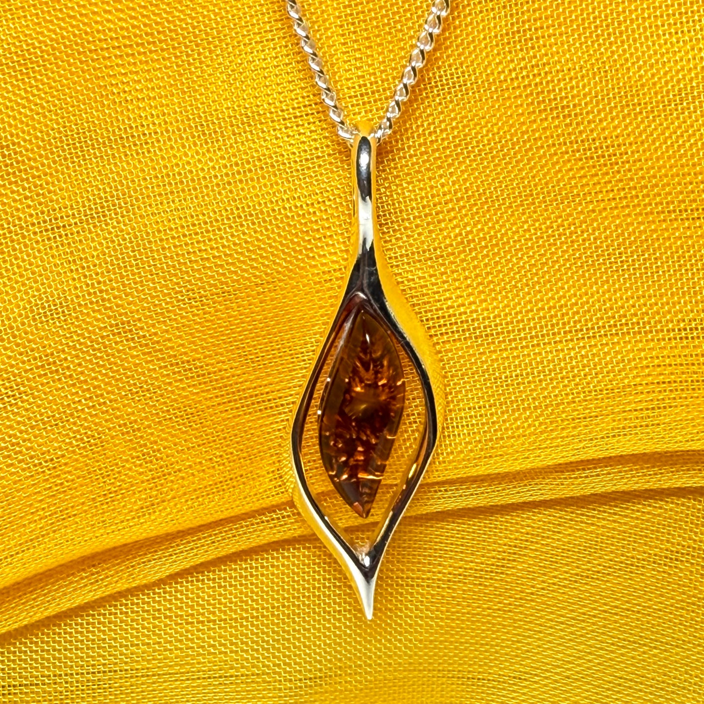 Real amber necklace sterling silver open twisted marquise shaped pendant