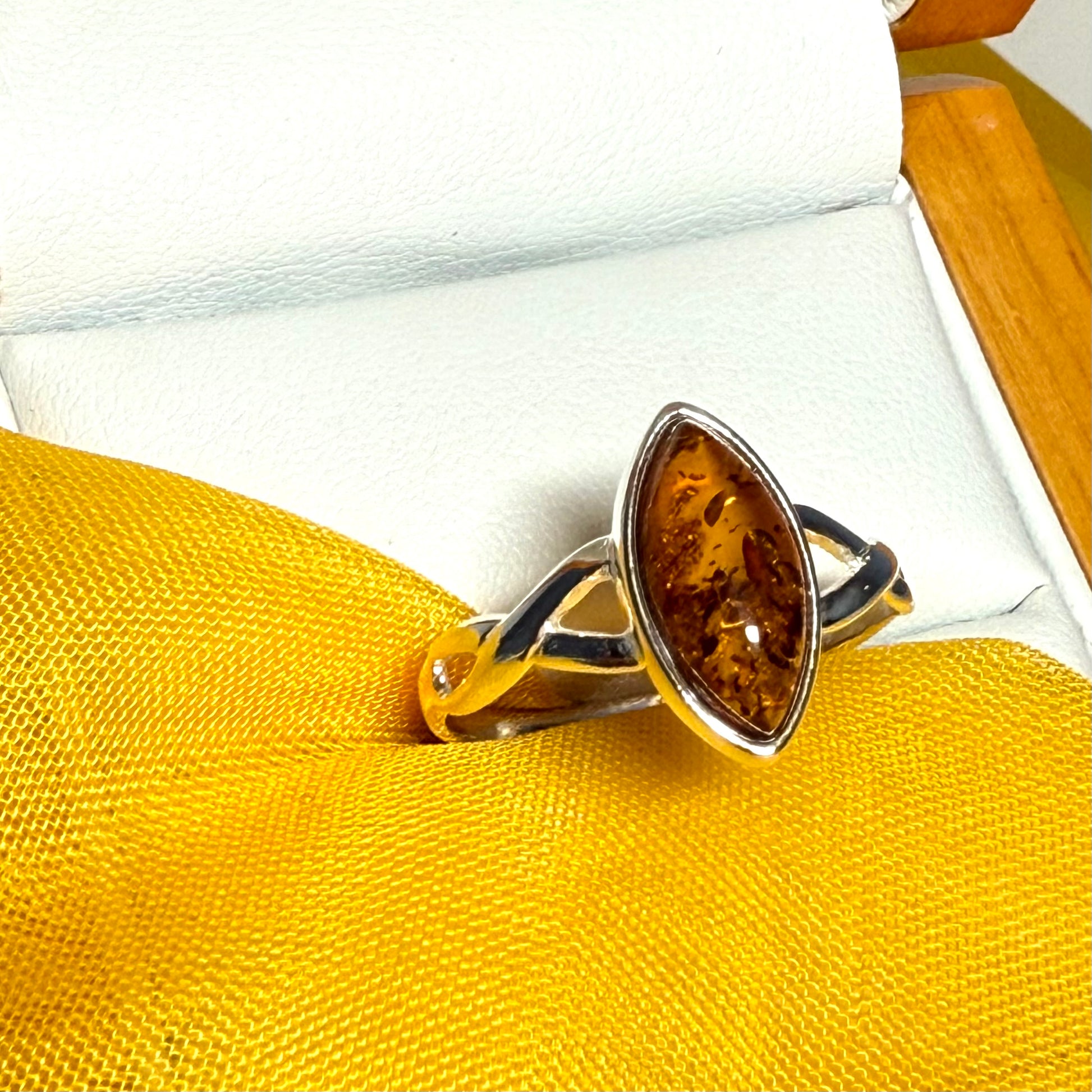 Real amber ring sterling silver marquise shaped smooth rubbed over setting pierced shoulders