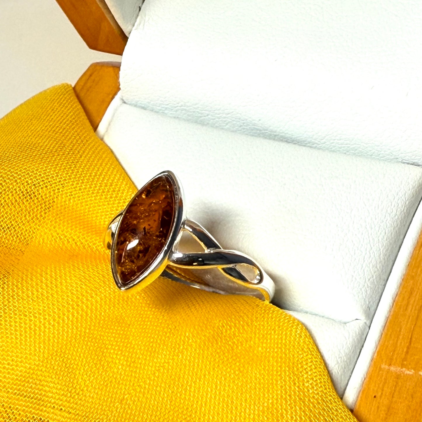 Real amber ring sterling silver marquise shaped smooth rubbed over setting pierced shoulders