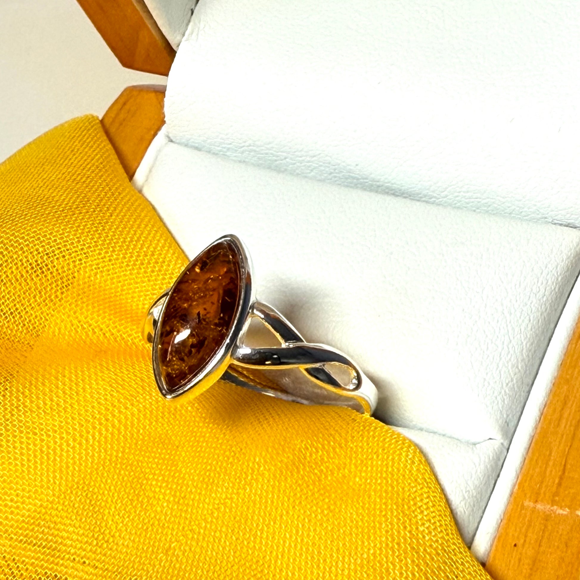 Real amber ring sterling silver marquise shaped smooth rubbed over setting pierced shoulders
