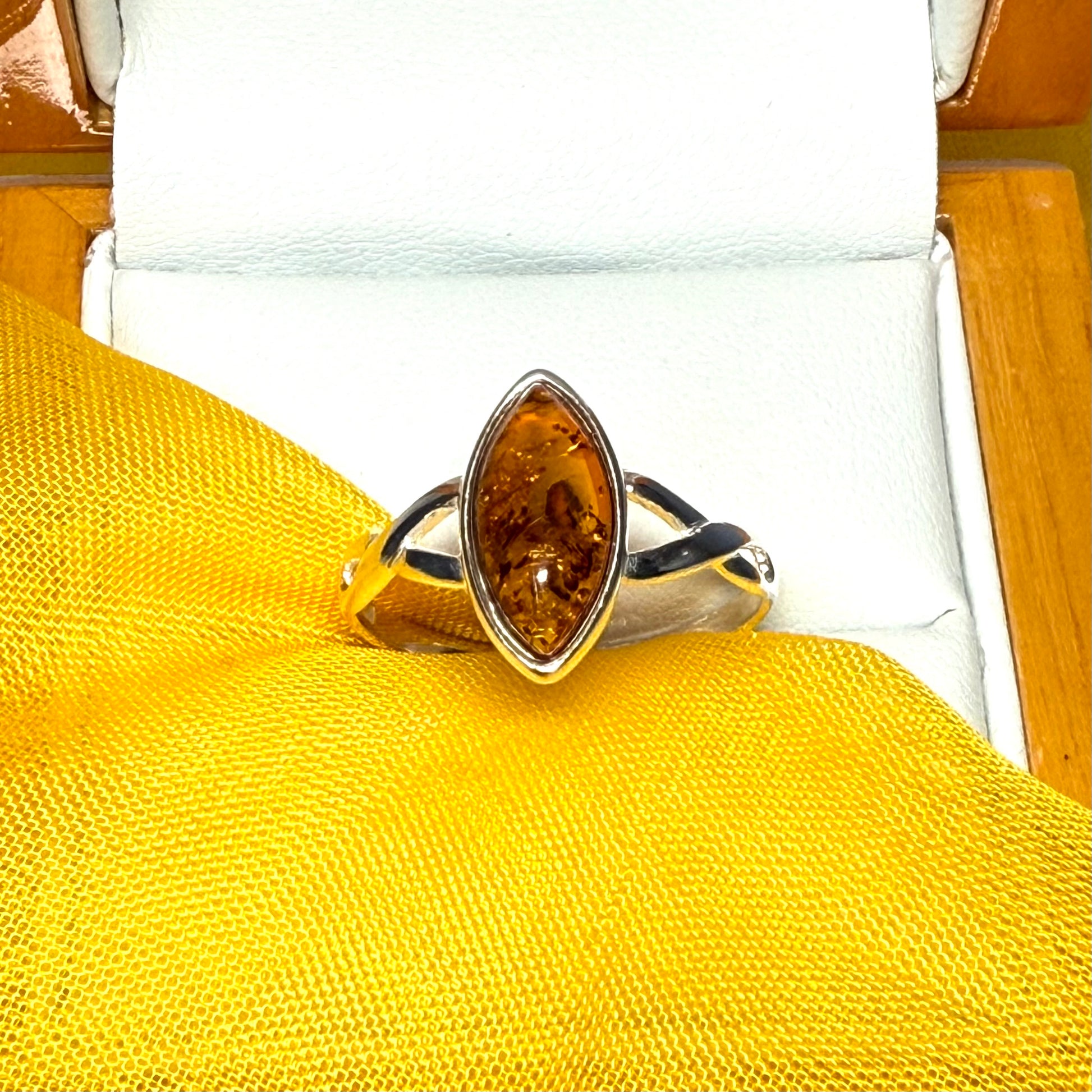 Real amber ring sterling silver marquise shaped smooth rubbed over setting pierced shoulders
