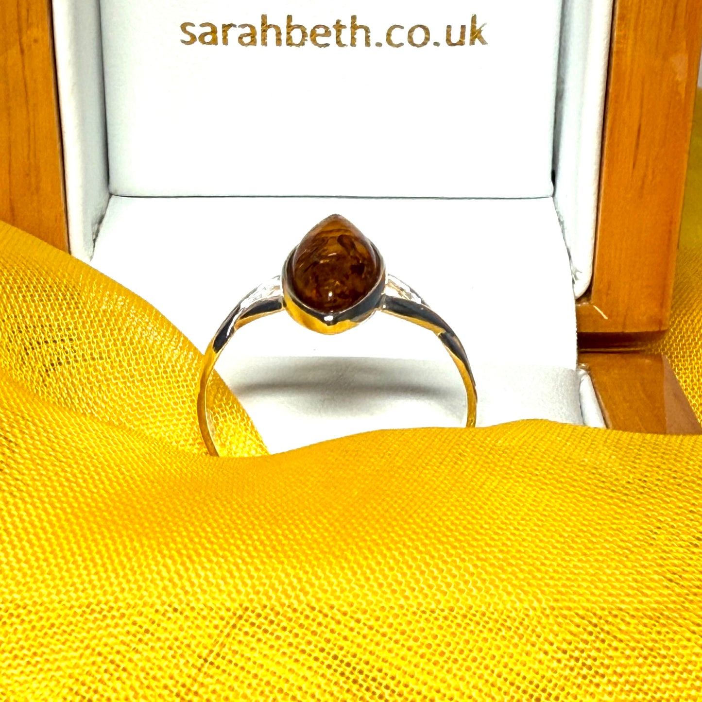 Real amber ring sterling silver marquise shaped smooth rubbed over setting pierced shoulders