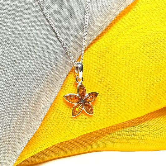 Real amber star shaped necklace sterling silver pendant
