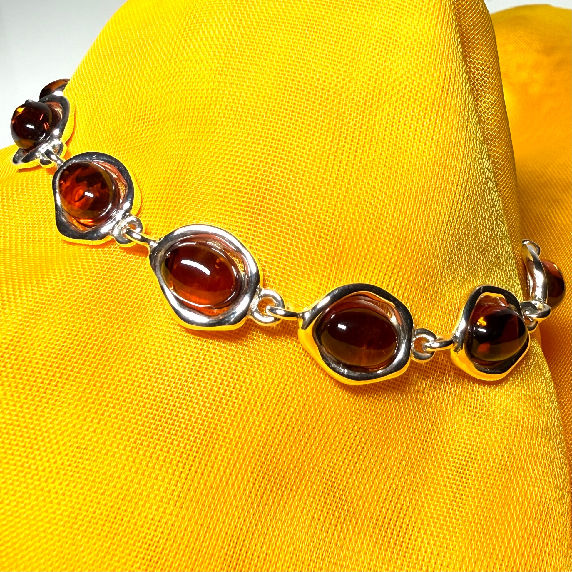 Real amber sterling silver fancy oval shaped bracelet