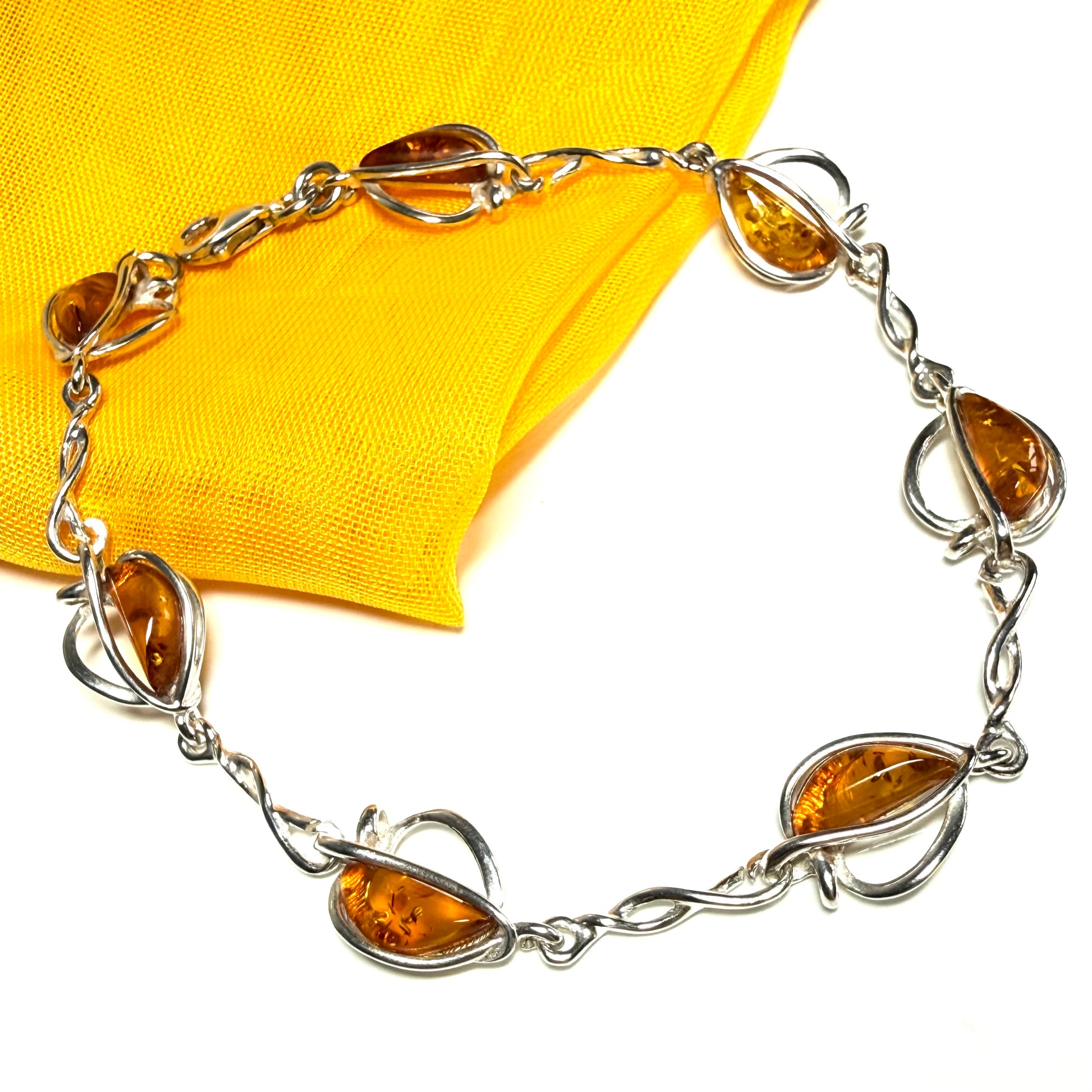 Real amber sterling silver heart shaped bracelet