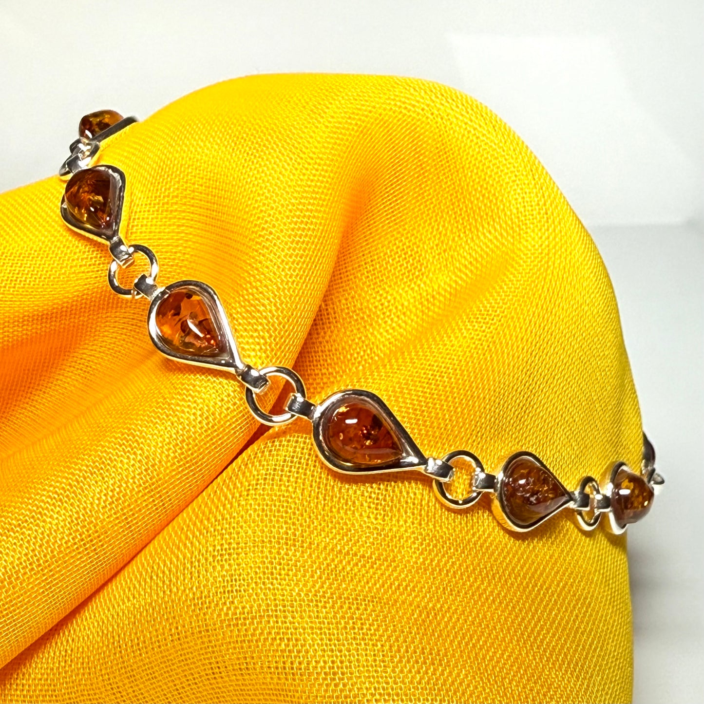 Real amber sterling silver pear shaped bracelet