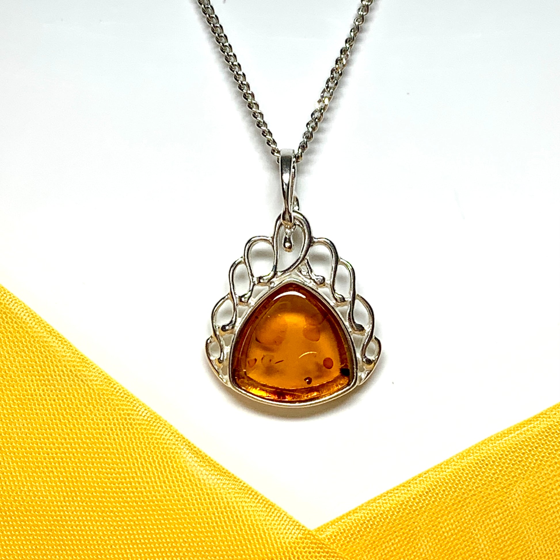 Real amber necklace sterling silver scrolled pendant