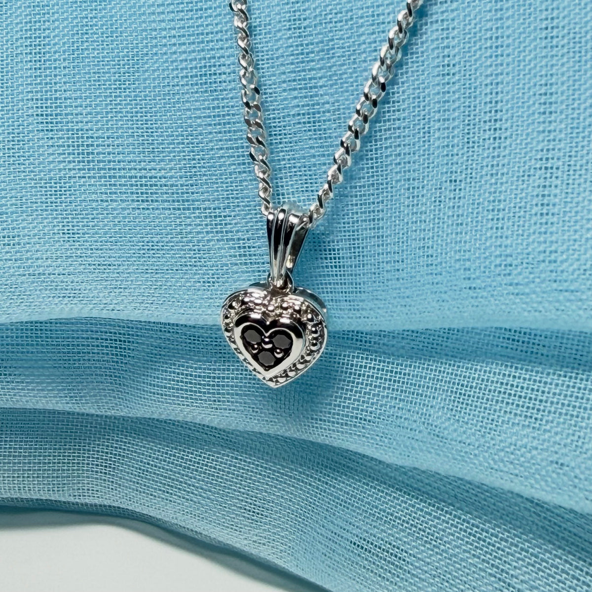 Real black and white diamond heart shaped white gold necklace pendant
