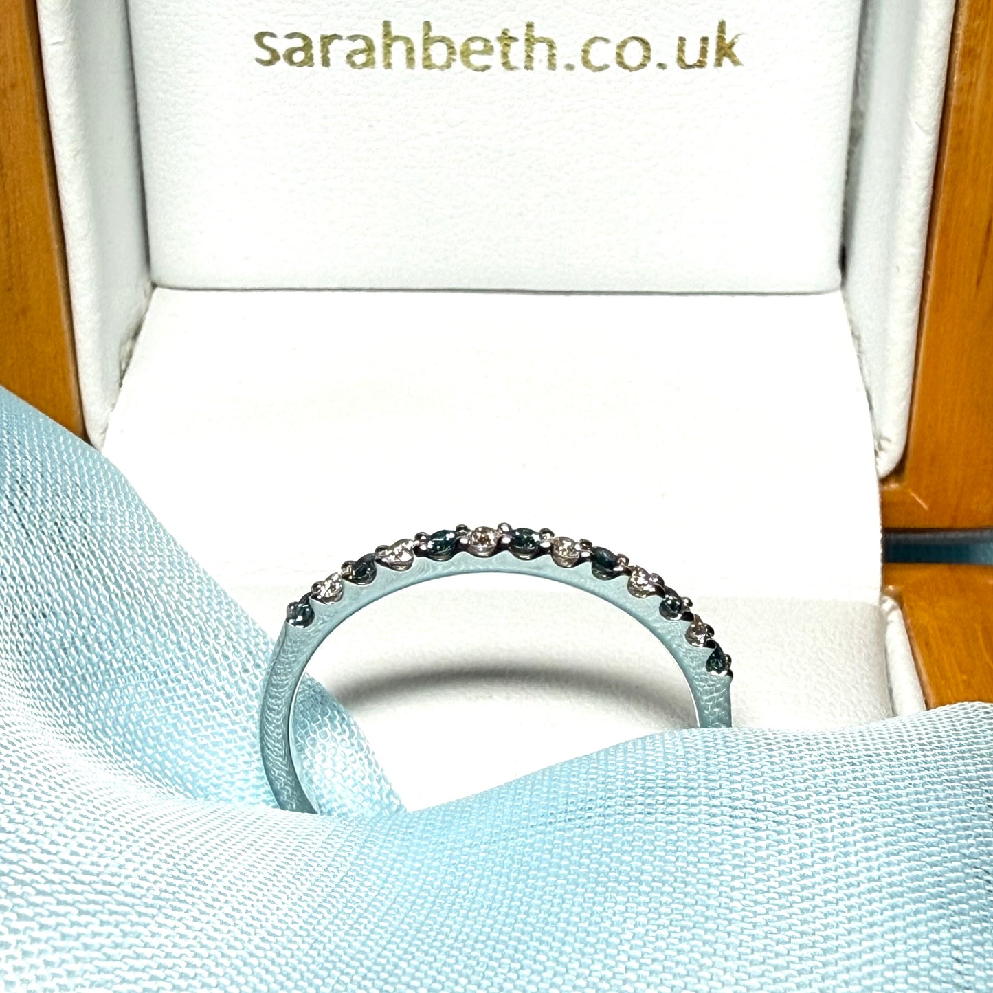 Real blue diamond eternity ring crafted in white gold
