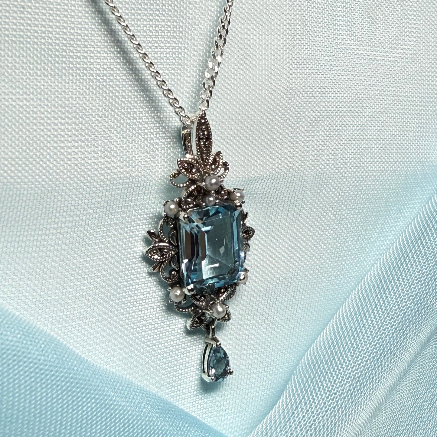 Real blue topaz and real freshwater pearl necklace pendant with real marcasite stones
