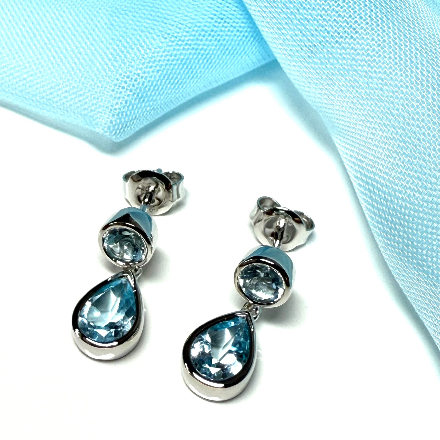 Real blue topaz double drop earrings sterling silver rubbed over
